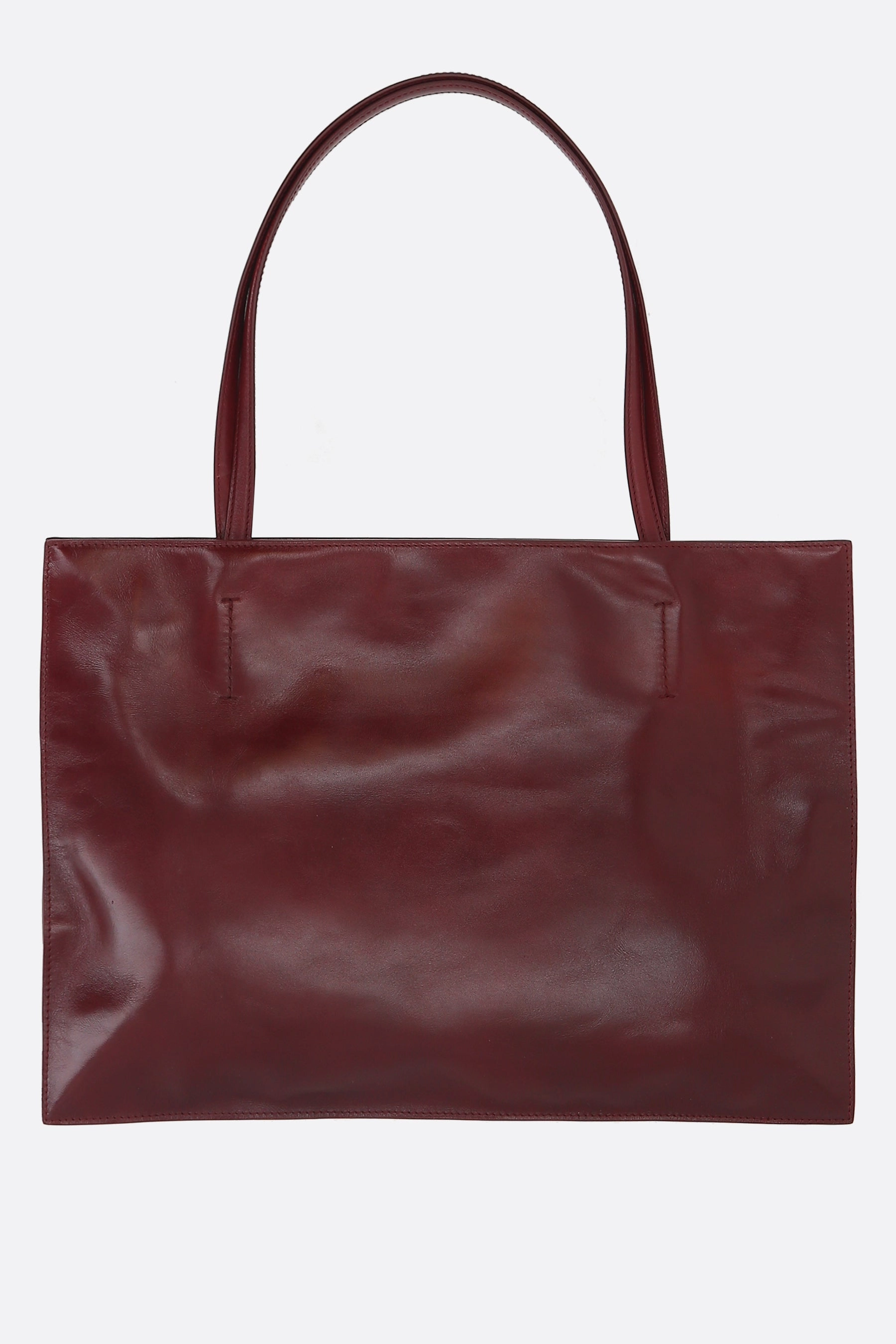 Yumi Sling handbag in glossy leather