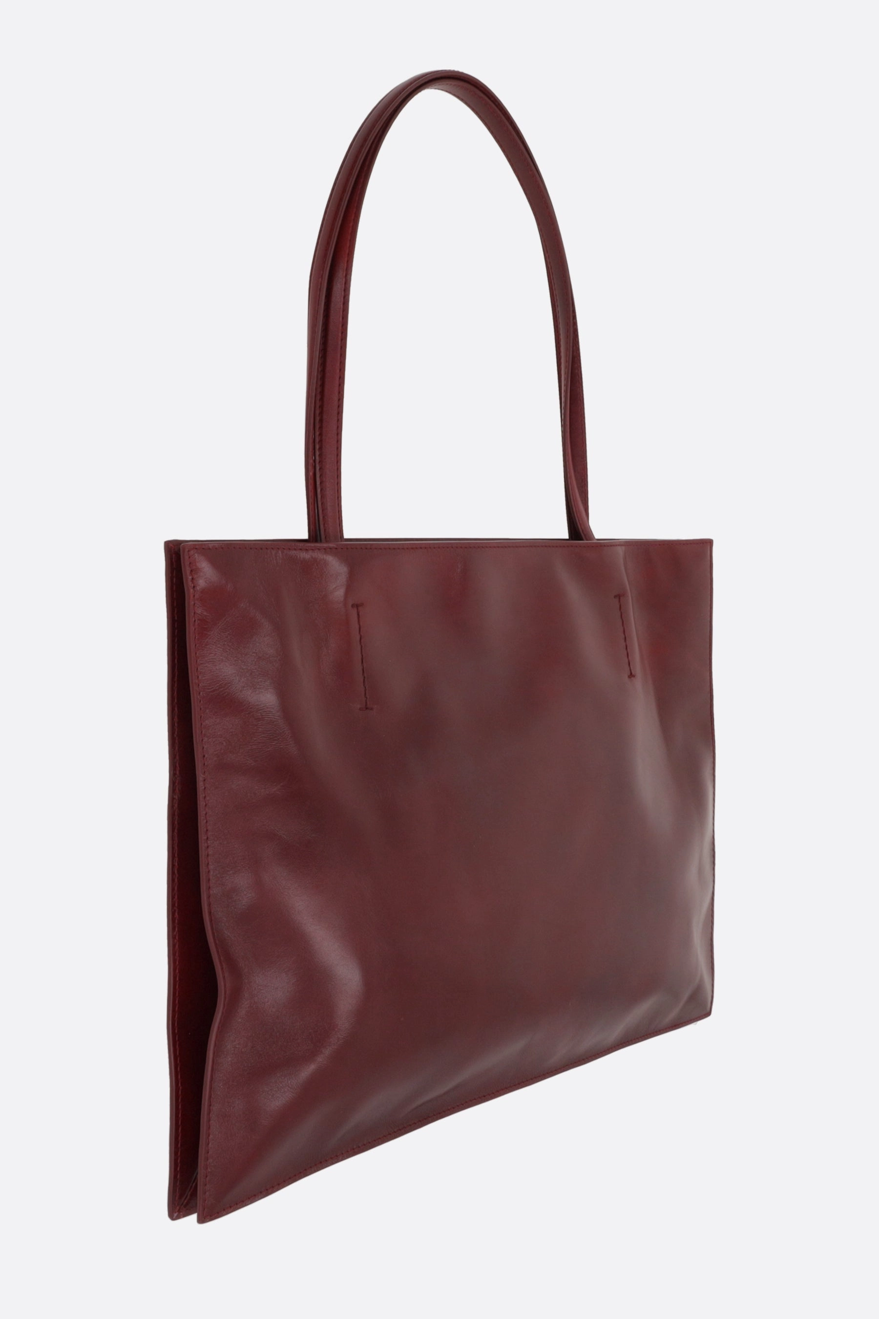 Yumi Sling handbag in glossy leather