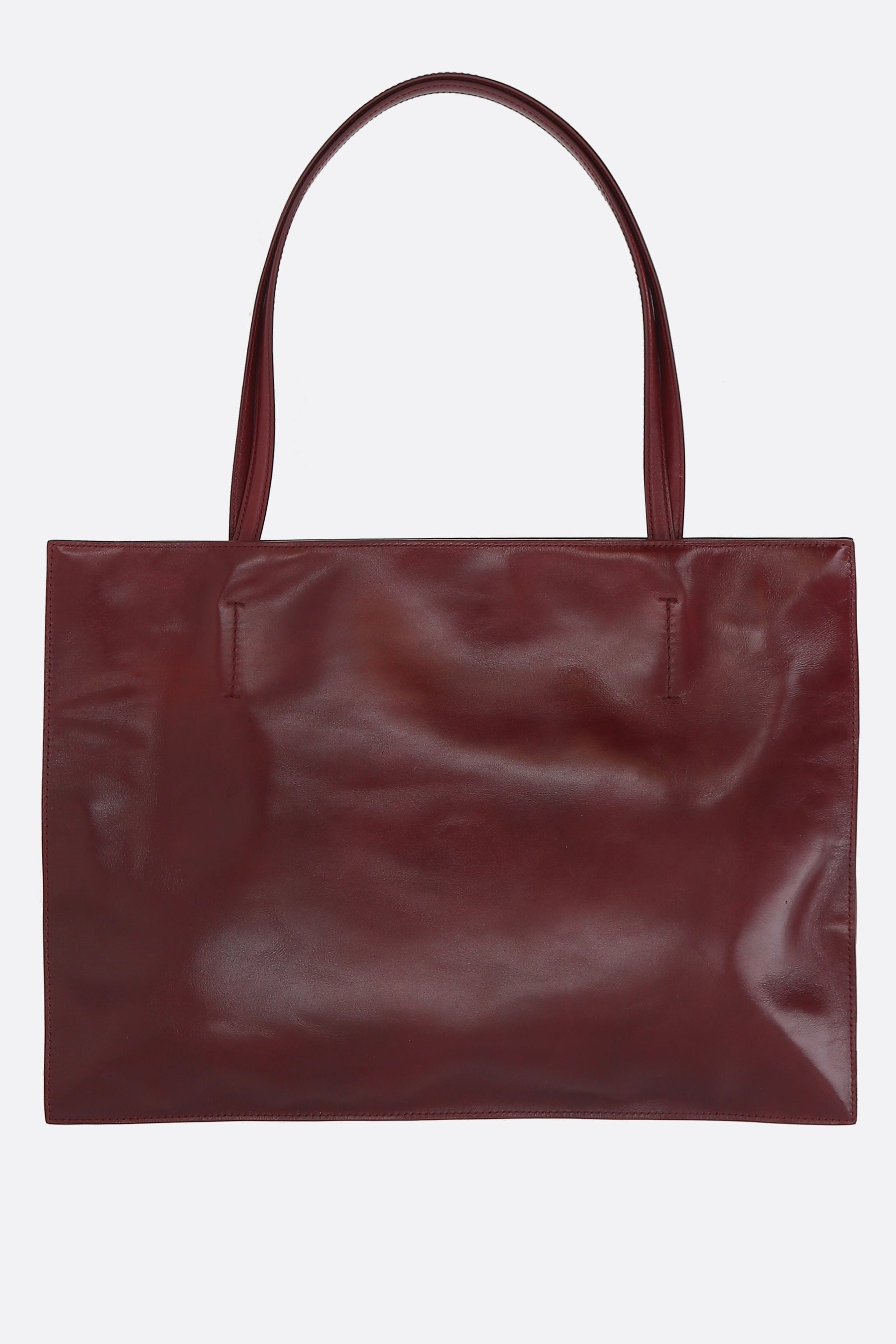 Yumi Sling handbag in glossy leather
